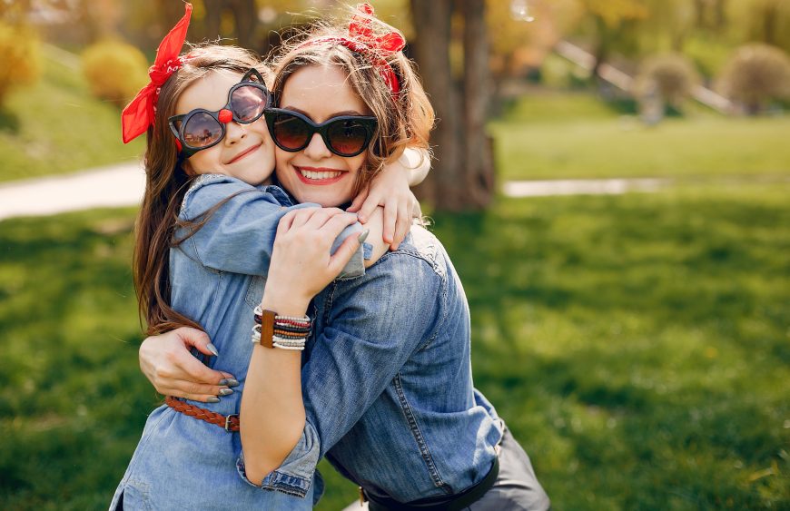 Cute and stylish family in a spring park